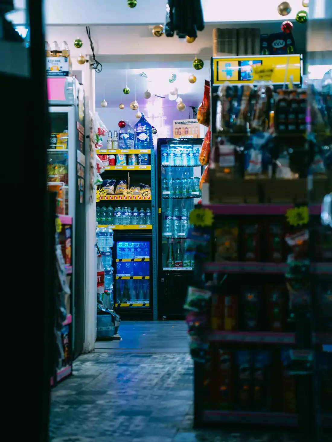 Brightly lit convenience store aisle