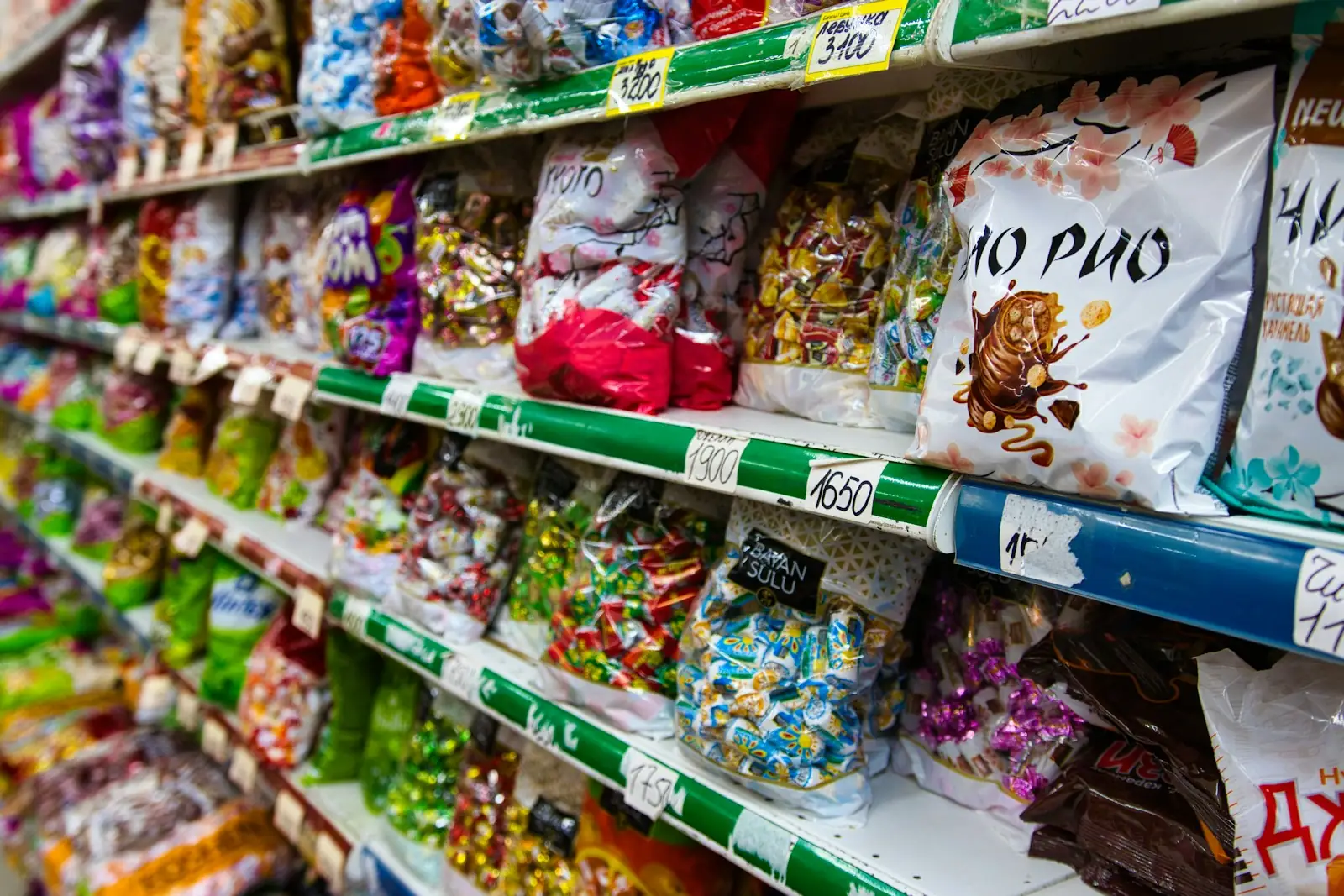 Shelves stocked with snacks and candy